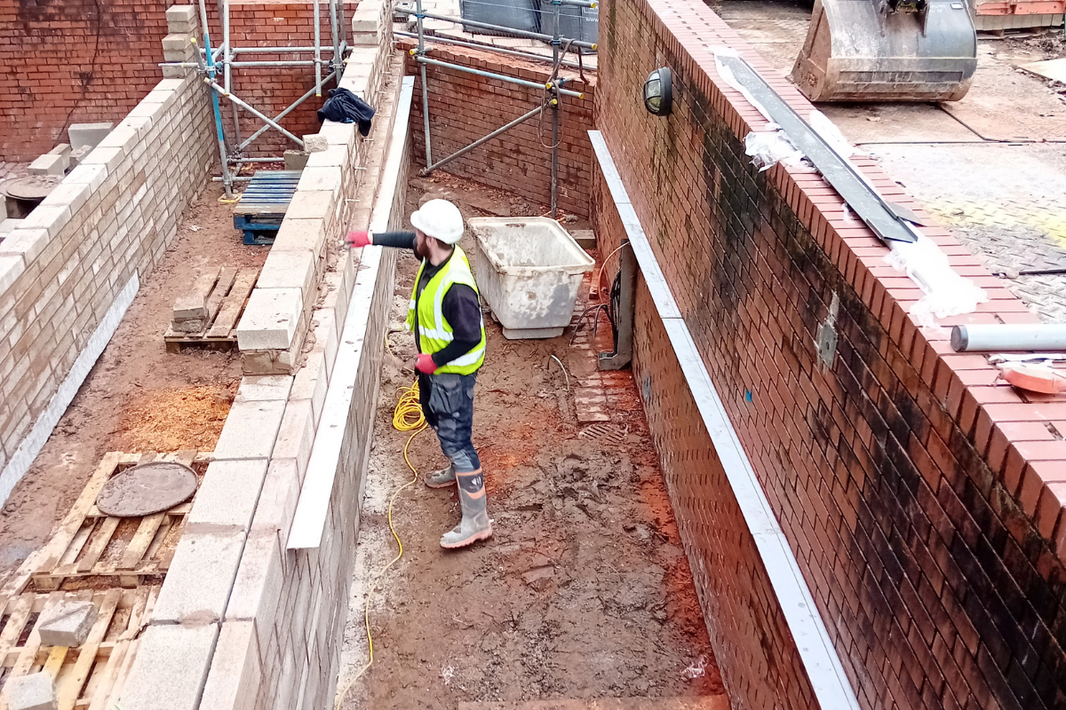 Groundworks team constructing a new access ramp and pathway.