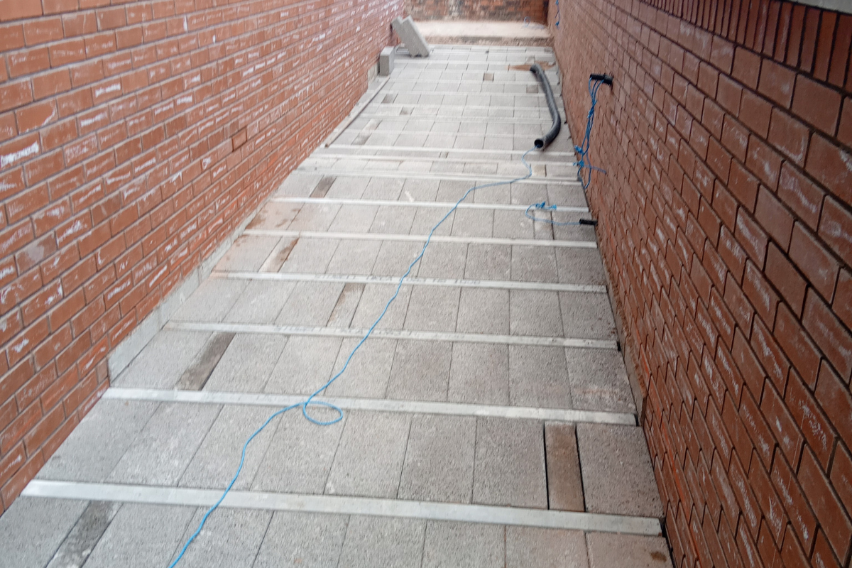 Beam and block construction prepared for paving installation.