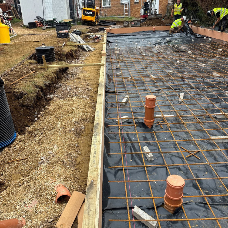 Reinforced concrete foundation preparation for commercial development.