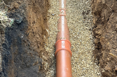 Underground utility and drainage installation completed for commercial development.
