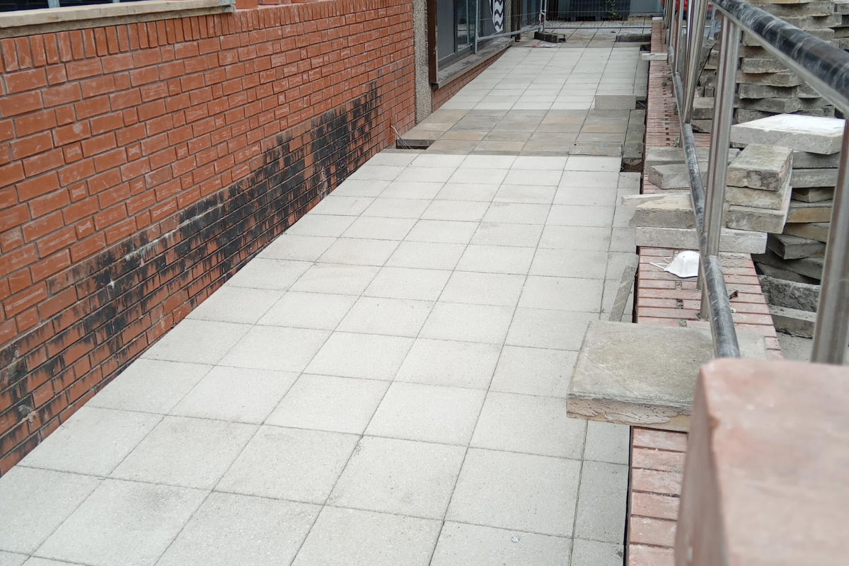 Completed paved access ramp finished by R12 Groundworks & Construction.