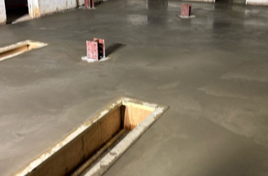 Newly poured concrete foundation slab completed by R12 Groundworks.