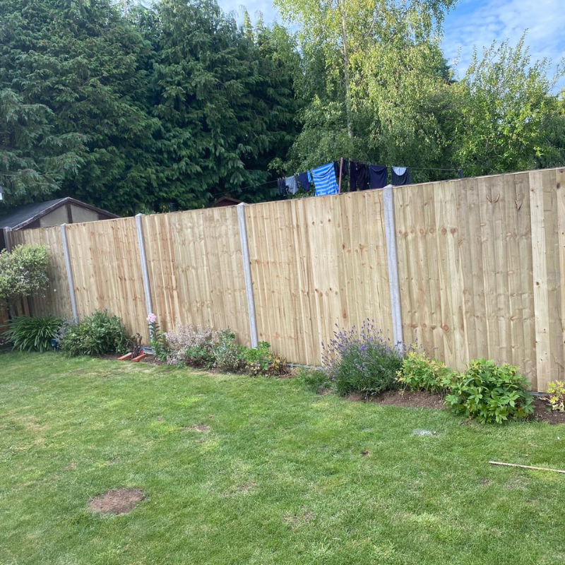 Timber garden fencing installed around a residential lawn in Bristol