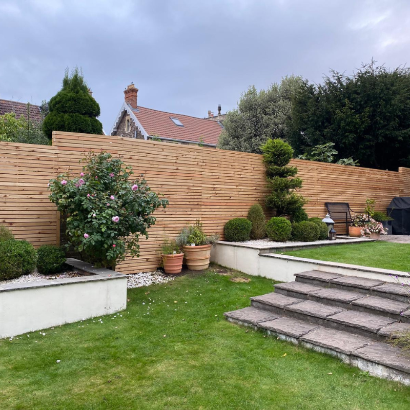 Contemporary timber fencing installed as part of a landscaped garden in Bristol