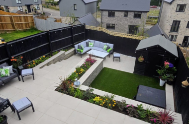 Complete garden renovation in Bristol featuring porcelain paving, raised planters, planting and outdoor living space