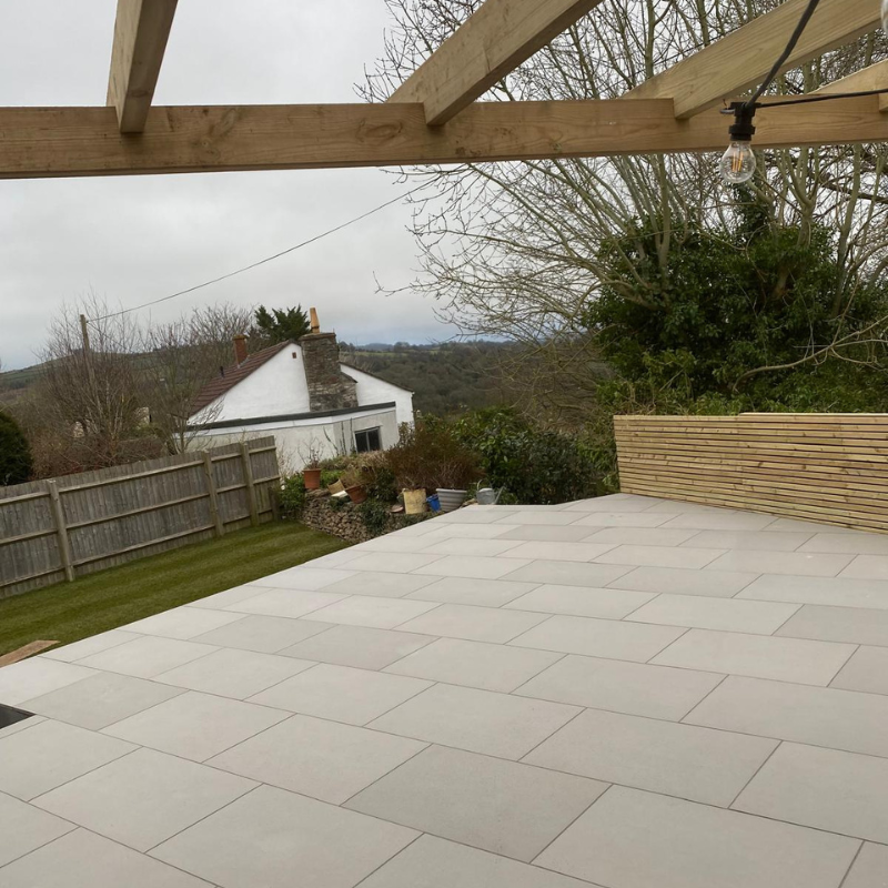Large porcelain patio installation completed for a domestic property.