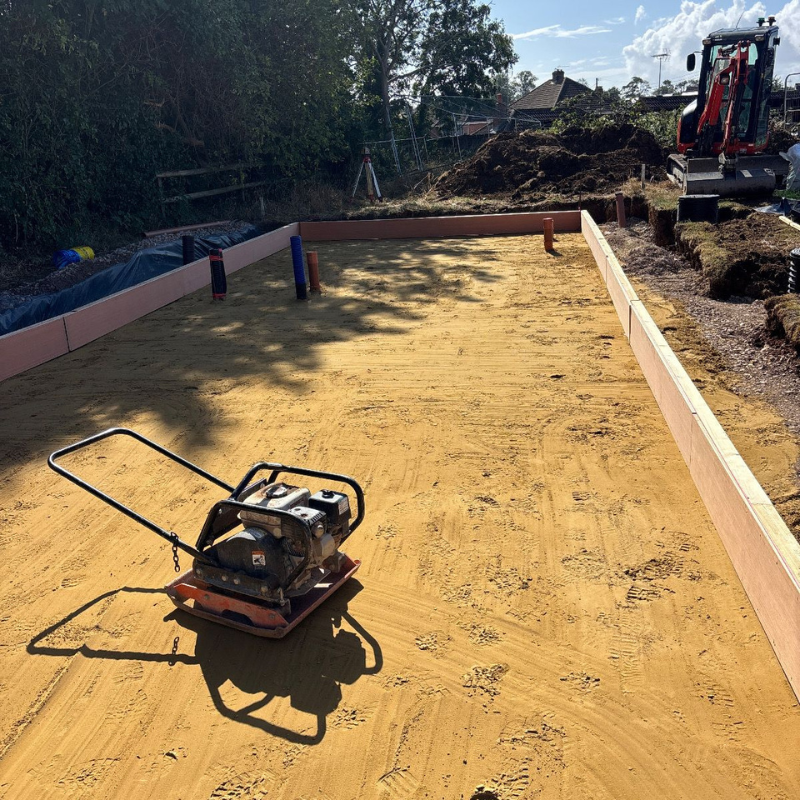 Site preparation and sub-base installation for commercial foundations.